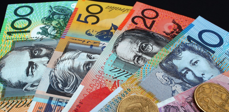 Australian Dollar Dips as RBA Maintains Restrictive Policy