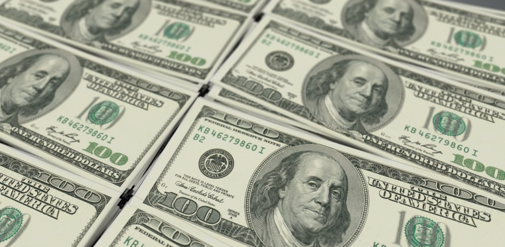 USD/CAD Nears 1.3900 as Strong US Data Backs Fed Pause